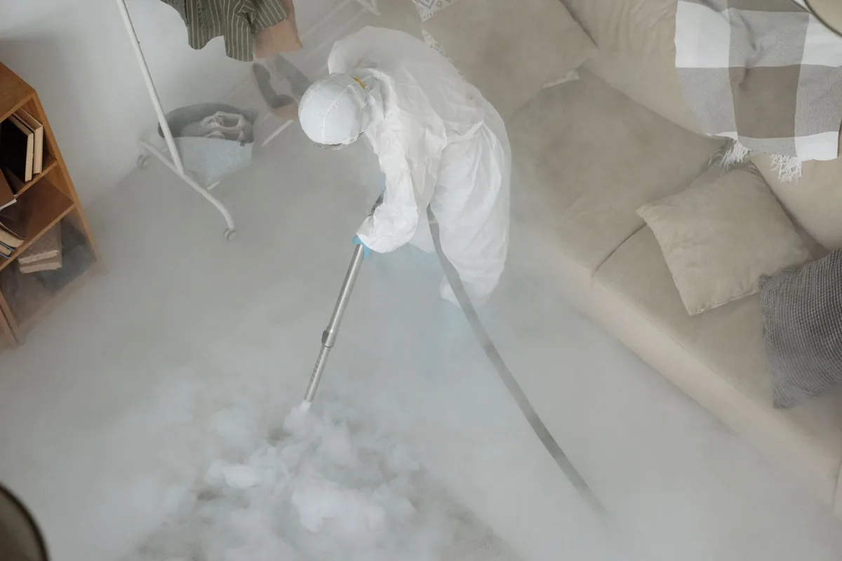 Biohazard cleanup technician in protective equipment, Tarpon River, Fort Lauderdale, FL